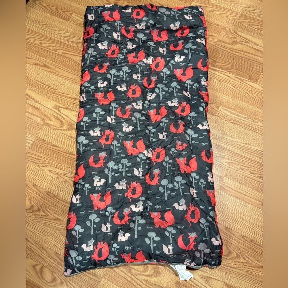 Ozark Trail Youth warm weather sleeping bag with a fox and tree pattern